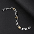Detail of stainless steel Figaro chain with gold beads on a black leather background - 8mm Wide / Silver Gold Bracelet / 21cm Length