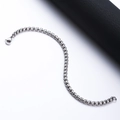 Minimalistisches Edelstahl Rolo-Armband mit Karabinerverschluss auf weißem Grund - 21cm / 3mm / Stahlfarben