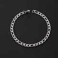 Detailed macro view of classic silver stainless steel Figaro chain with lobster clasp - Figaro Chain