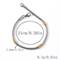 Detailed view of silver stainless steel snake chain with gold ring accents and lobster clasp - Round Snake Chain Style