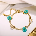 Detailed close-up of double-layer gold chain bracelet with turquoise and pearl bead flowers - Beaded Flower Style (Style 3)