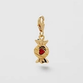 Detailed view of a gold candy pendant with a red heart-shaped gemstone and lobster clasp - Candy Pendant