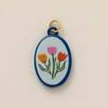 Gold-plated oval pendant with blue enamel and colorful tulip flower illustration - Three-Color Flower Pendant