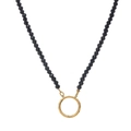 Fashion necklace with black faceted beads and a smooth golden circular pendant charm - Black Beads with Gold Ring Pendant Necklace