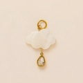 Detailed close-up of a white cloud-shaped pendant with a gold teardrop gemstone dangle - White Cloud Droplet Pendant