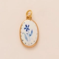 Oval brass 18K gold plated pendant with blue floral pattern on white enamel insert - Round Blue Flower Style