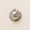 Detailed macro shot of a silver hamburger pendant with colorful enamel layered detailing - Hamburger