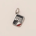 Detailed macro view of black enamel 'SPICY' pendant with polished steel sticker effect - Spicy Bottle Pendant