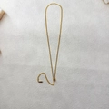 Detailed view of adjustable golden chain necklace with lobster clasp and extender - Adjustable / Gold