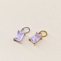 Close-up of radiant cut purple zircon charms with 18K gold and silver plated settings - February Violet - Silver