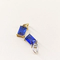 Detail of rectangular blue zircon birthstone charms with polished gold and silver plating - September Royal Blue - Silver