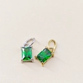 Detailed macro view of 14K gold and silver plated rectangular emerald zircon pendants - May Green - Silver
