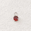 7x7mm round ruby-red zircon pendant with silver stainless steel four-prong setting - January Red - Silver
