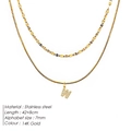 Collana a doppio strato in acciaio inossidabile dorato 14K con pendente lettera W - Stile Lettera W