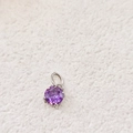 Polished silver pendant with vibrant purple round cubic zirconia in four-prong setting - June Purple - Silver