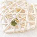 Elegant round 7x7 green zircon pendant in golden four-claw setting on white base - August Light Green - Gold