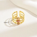 Detalle de anillo triple capa chapado en oro 18K con gemas rosas y ancho de 15 mm - US7 / Oro de 18k