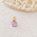 Pink round-cut zircon pendant with golden four-prong setting and minimalist metal bail - October Pink - Gold