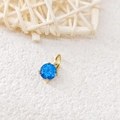 Blue round 7x7 zircon pendant in gold-plated four-prong setting with top bail - December Lake Blue - Gold
