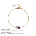 14K gold bracelet featuring white rectangle and red teardrop zircon stones - April White Square Red Teardrop