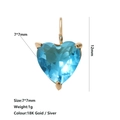 Detail view of a 7x7mm blue heart-shaped zircon pendant with 18K gold-plated setting - December Lake Blue Heart Pendant (Gold Base)