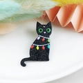 Sparkly black acrylic Christmas cat charm with festive colorful lights and green eyes - Black Cat with Lights (5)