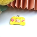 Yellow resin game console charm with cute cartoon prints and silver metal loop for DIY crafts - Yellow