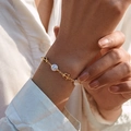 Elegant gold plated bracelet featuring white freshwater pearls and hollow butterfly charms - Hollow Butterfly Pearl Chain Style (KB0057)