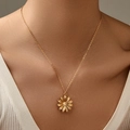 Elegant gold necklace with a detailed daisy flower pendant and a central zircon stone - Daisy Shape Style (KN0338)