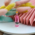 Pink resin miniature liquor bottle pendant with silver ring for DIY craft jewelry - Pink