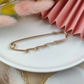 Close-up of golden safety pin brooch with four loops for DIY jewelry making and crafts - Large Brooch
