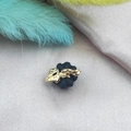 Macro shot of 3D pumpkin pendant with matte black base and gold leaf decoration - Black