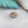 Pink enamel pumpkin charm with gold leaf detail for DIY jewelry on purple silk background - Pink
