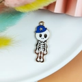 Cartoon skeleton pendant with blue star hat on white tray for DIY jewelry making - KC Gold Edge Male Skeleton