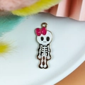 Cute Halloween skeleton charm with pink bow and gold edges for jewelry making - KC Gold Edge Female Skeleton