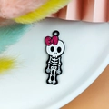 Cartoon skeleton alloy charm with pink bow and black oil drip finish for DIY jewelry - Black Edge Female Skeleton