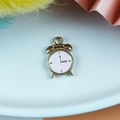 Mini alarm clock shaped alloy pendant with pink enamel finish and golden frame - Pink