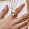 Close-up of gold layered bow ring with irregular multi-strand design on model's finger - Multi-Layer Wire Wrap Style (KR0171)