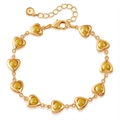 Detail of 18K gold-plated heart links with amber gemstones and lobster clasp closure - Amber Heart Bracelet (KB0799-3)