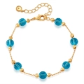 Detailed view of gold chain bracelet with blue faceted crystal beads and lobster clasp - Sky Blue Bead Gold Chain Bracelet (KB0803-3)