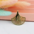 Detailed view of a gold hollow fan-shaped ginkgo leaf charm for DIY jewelry making - KC Gold Fan Shape