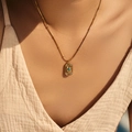Vintage gold necklace featuring a rectangular turquoise pendant on a beaded chain - Blue Stone Sunburst Style (SN0011)