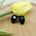 Black resin game controller pendant with colorful buttons and silver metal loop - Black