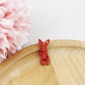 Red matte bunny pendant with unique stitch texture on a minimalist wooden tray - Red Rabbit