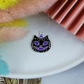 Detail of Halloween black cat and pumpkin charm with purple enamel drip finish - White Black Pumpkin