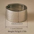 Exaggerated wide alloy cuff bracelet in silver finish with hammered metal texture - Hammered Silver Hinged Bangle (SZ60789-4)