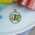 Ciondolo a forma di Saturno in lega dorata con pietra occhio di gatto gialla e stella - Pianeta Occhio di Gatto Beige
