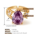 Detail of 18k gold plated copper ring with pear-shaped purple zircon and crystal accents - One Size / Purple Pear Main Stone Style (KR0288)