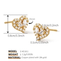 Macro detail of 18k gold plated heart earrings featuring sparkling marquise cut zircons - Pavé Heart Style (KE1811)