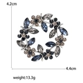 Detail showing dimensions of crystal olive wreath brooch measuring 4.2cm by 4.4cm - Gray